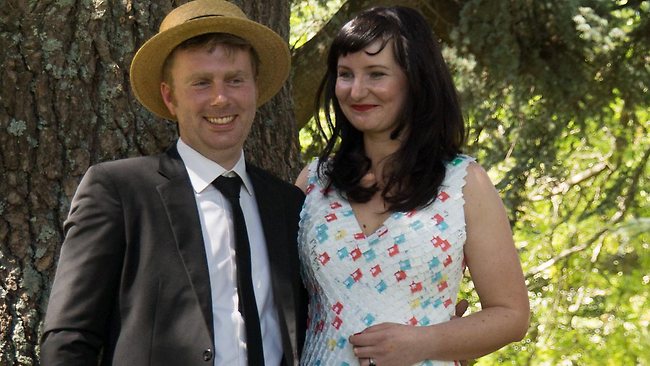 Will Wapling and Stephanie Watson on their wedding day. Stephanie, a Victorian fashion designer, created her wedding dress from 10,000 bread tags