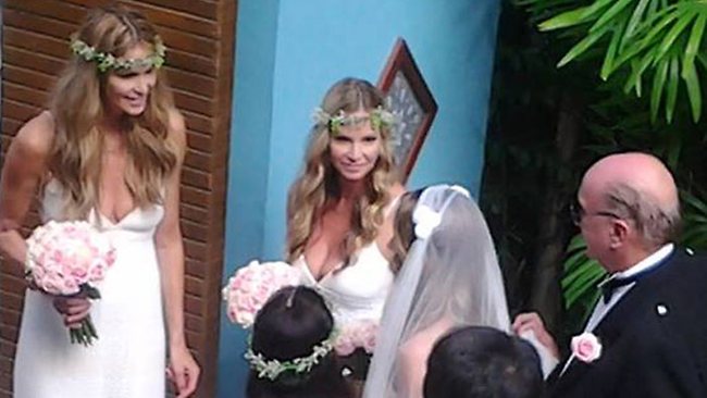 Elle Macpherson and sister Mimi act as bridesmaid for their sister Lizzie's wedding in Koh Samui, Thailand. Image: Splash News Australia 
