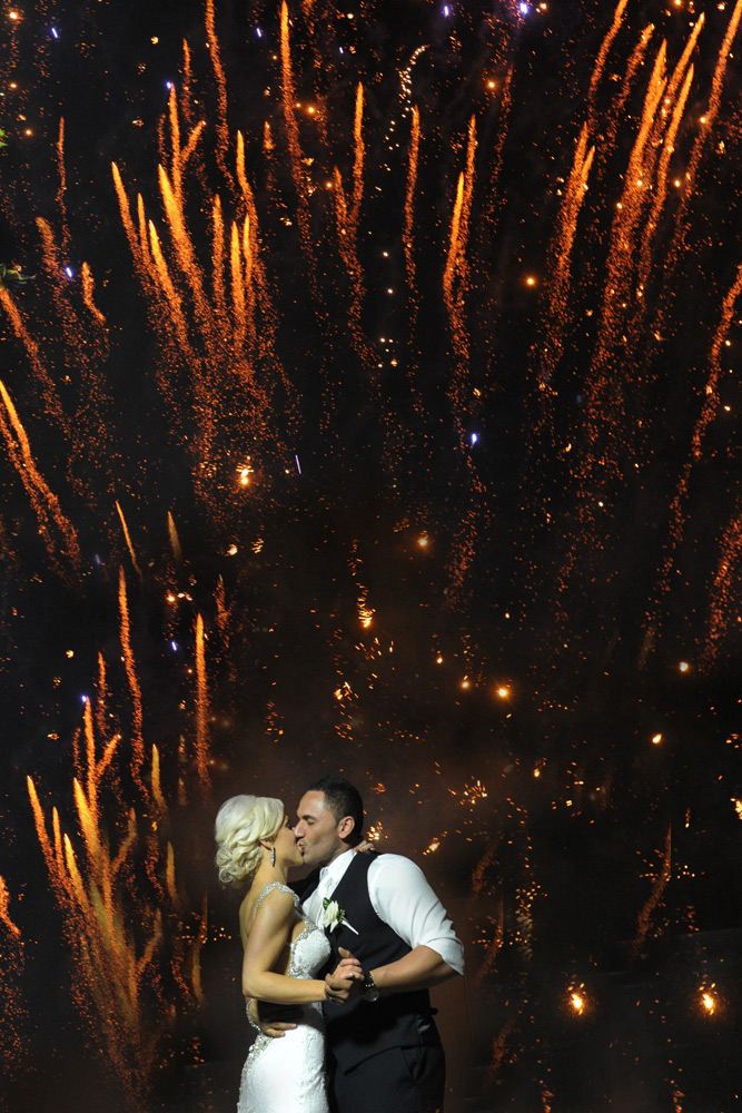 The x-metre high main doors at Villa Botanica were hand-carved in Bali over X months. Image: Iconic Bride Photography