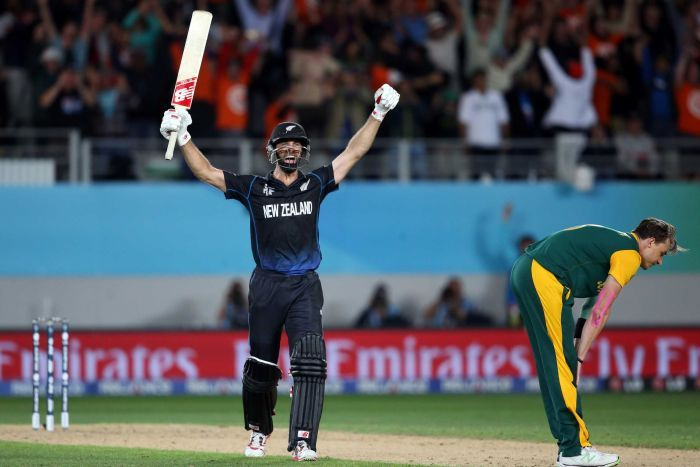 Grant Elliott celebrates his team's World Cup semi-final victory. Image: ABC/AFP Photo (Michael Bradley)
