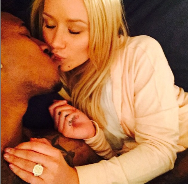 Iggy and her fiance Nick share a kiss in a photo posted on Iggy’s Instagram account. Image: Iggy Azalea via Instagram 