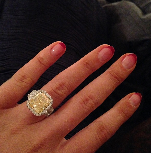 Iggy Azalea's instagram engagement announcement came with the caption, "Happiest Day #Isaidyes"