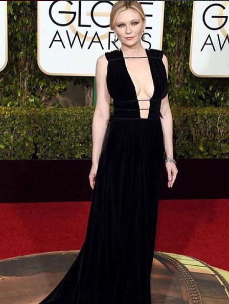Kirsten Dunst in a Grecian-inspired black velvet Valentino gown. Image: Valentino via Instagram 