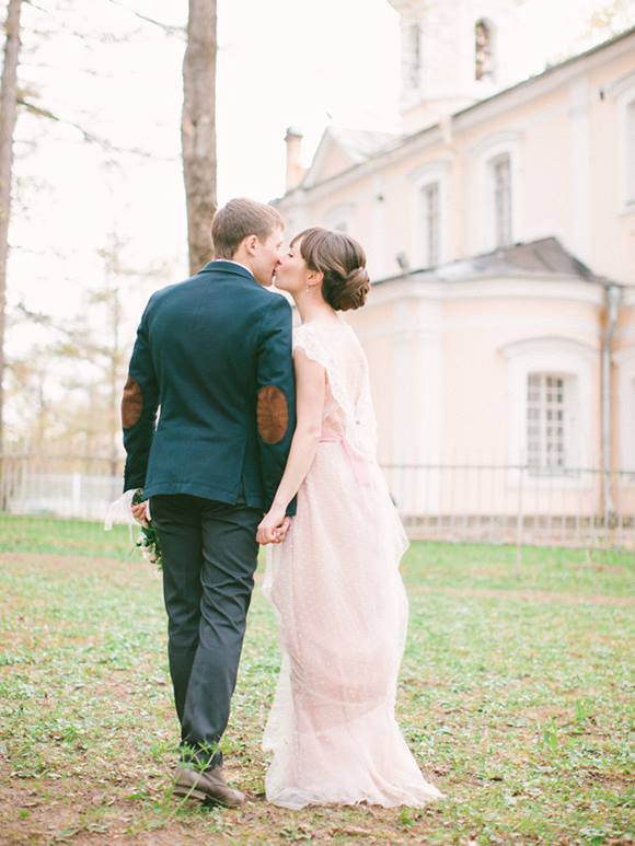 Lace wedding gown by Tanya Kochnova