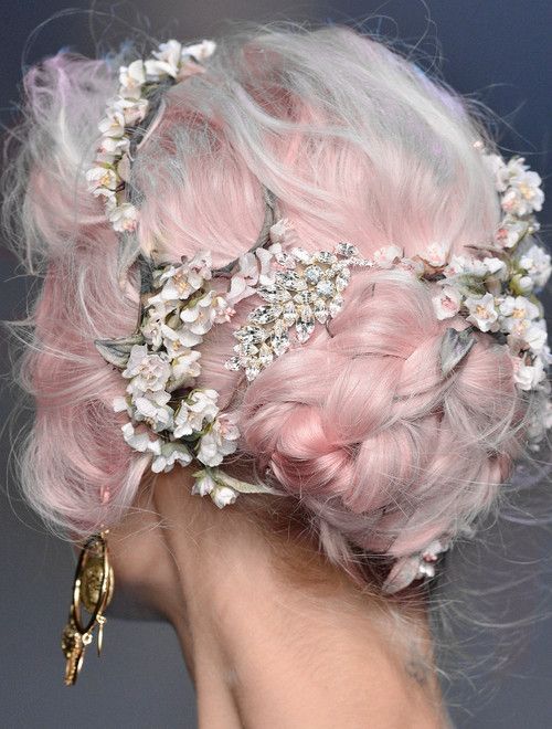 A Rose Quartz braided hairstyle adorned with little flowers would be a lovely bridesmaid or bridal hairstyle. Image: Dolce & Gabbanna 