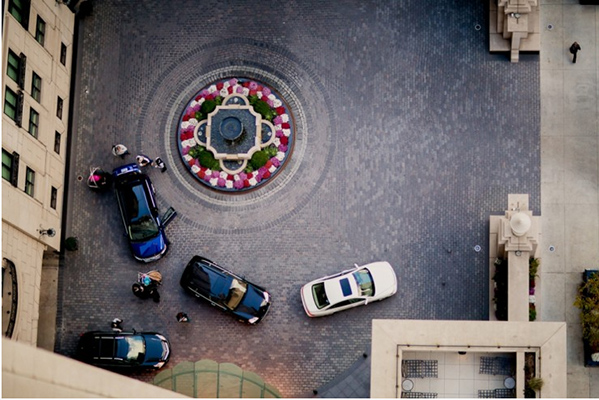 aerial view of the a bridal party arriving