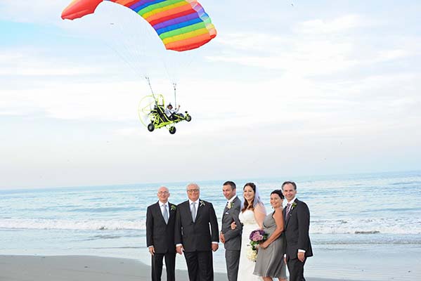 Talk about perfect timing... aerial wedding photobomb