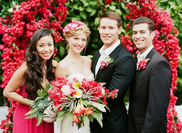 bridal party  and red roses