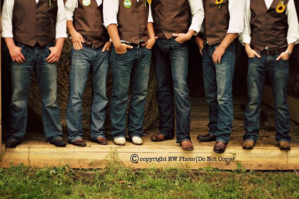 cowboy groomsmen wearing jeans at wedding