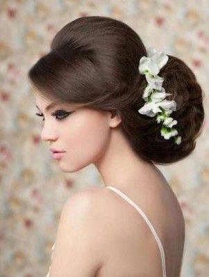 Serious wedding hairstyle with flowers