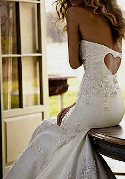 wedding dress with a heart on the back