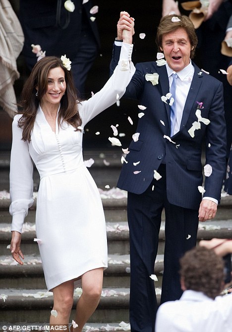 Newlyweds Paul McCartney and Nancy Shevell emerge from the Marylebone Town Hall Newlyweds Paul McCartney and Nancy Shevell emerge from the Marylebone Town Hall