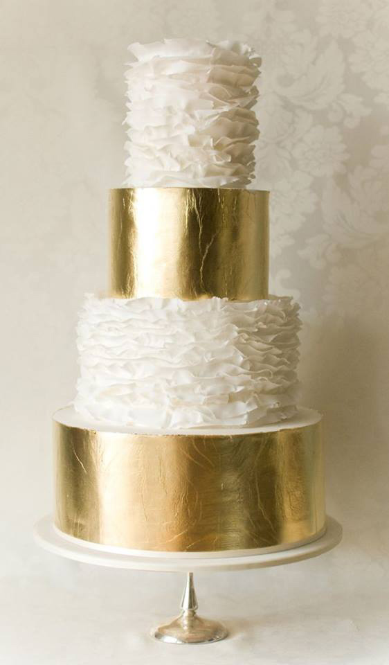 ruffled wedding cake with golden bands