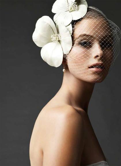 tiny but elegant veil with large flower details