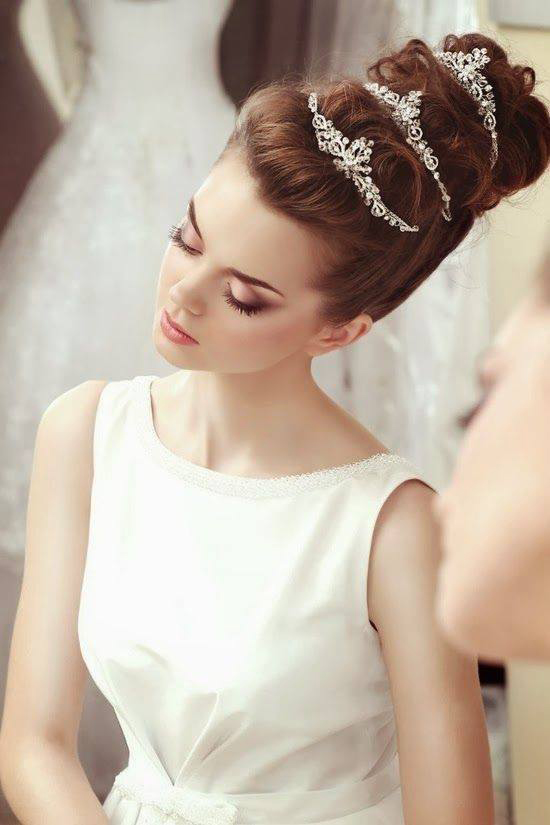 three tiaras in wedding hair