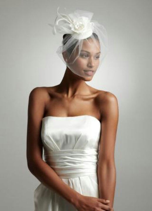 Fascinators are like mini hats. They're not huge and overbearing, but can still be elegantly ornate. 